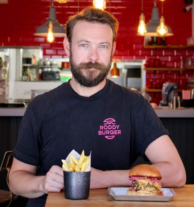 Richard with his signature burger