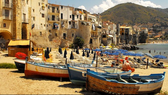 Fishing boats deliver their fresh catch directly to Sicily's Cefalu restaurants