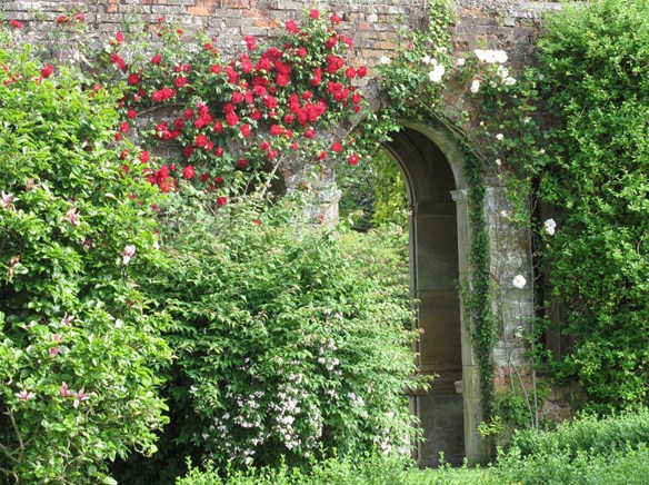 Falconhurst, near Edenbridge, incorporates the ruins of the old house in its gardens.