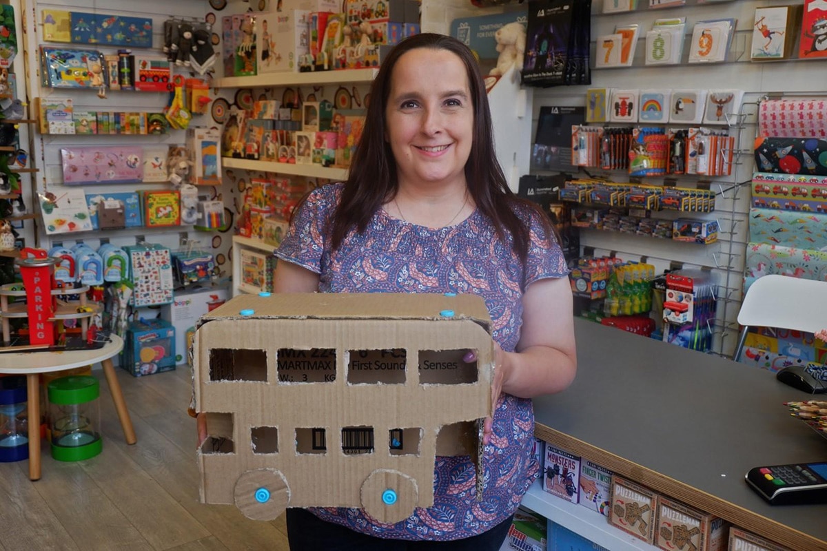 Woman holding whirligig toy
