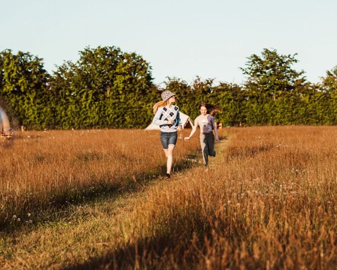 people running in a field