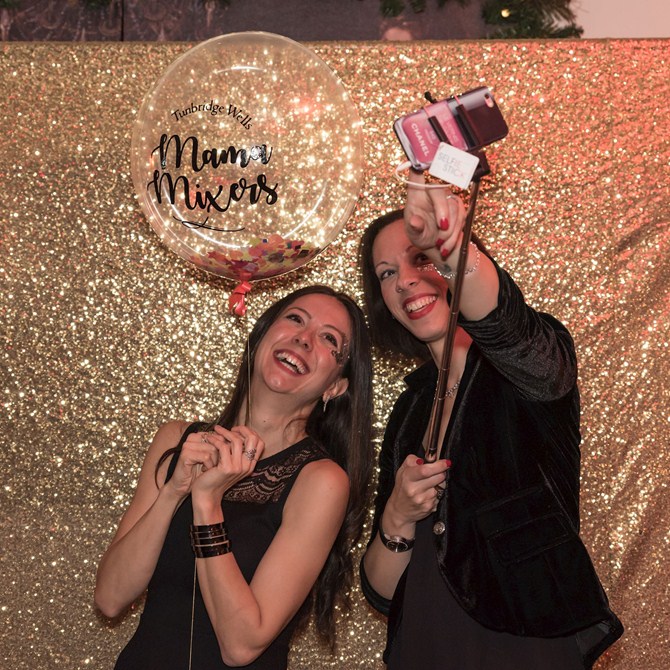 Two Women Taking a selfie at mama mixer