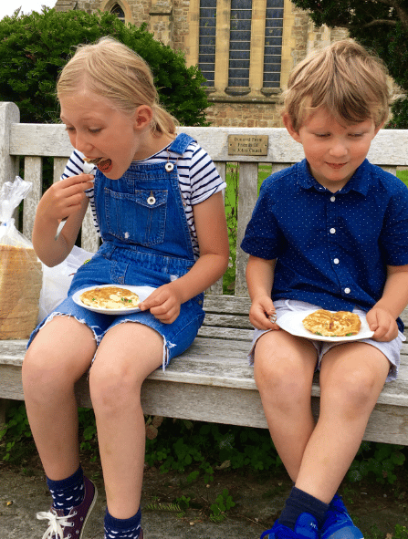 Children learn how to cook at farmers' market
