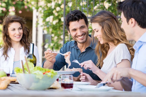 People having an al fresco meal