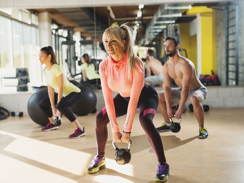 Women Working out with kettle bells
