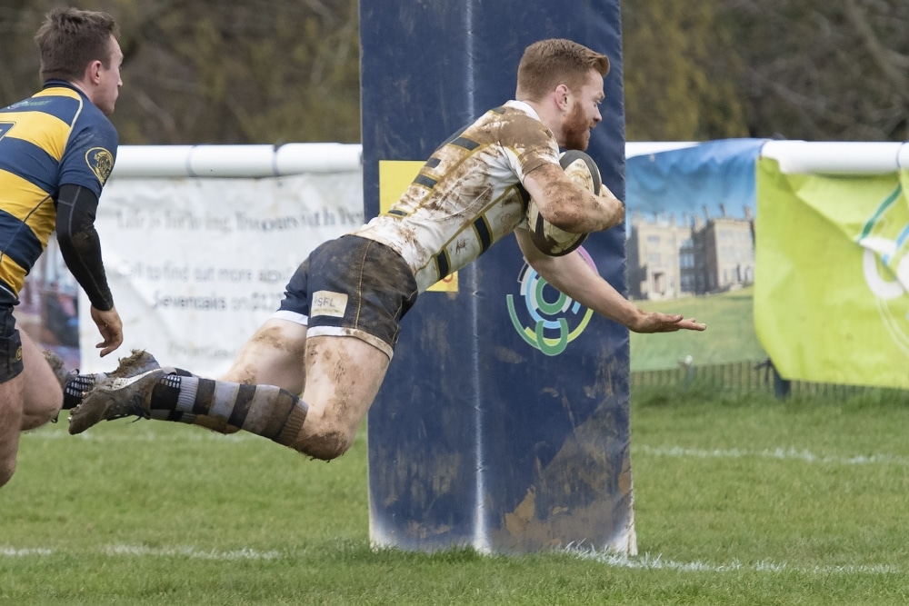Honours even again as wind plays havoc with kicks